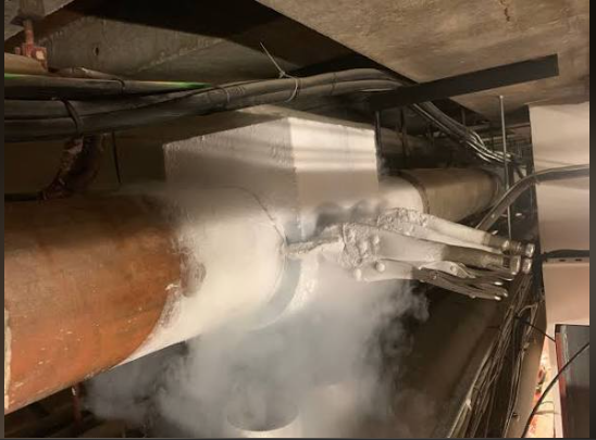 Ice plug forming on pipework during a liquid nitrogen freeze in a plant room